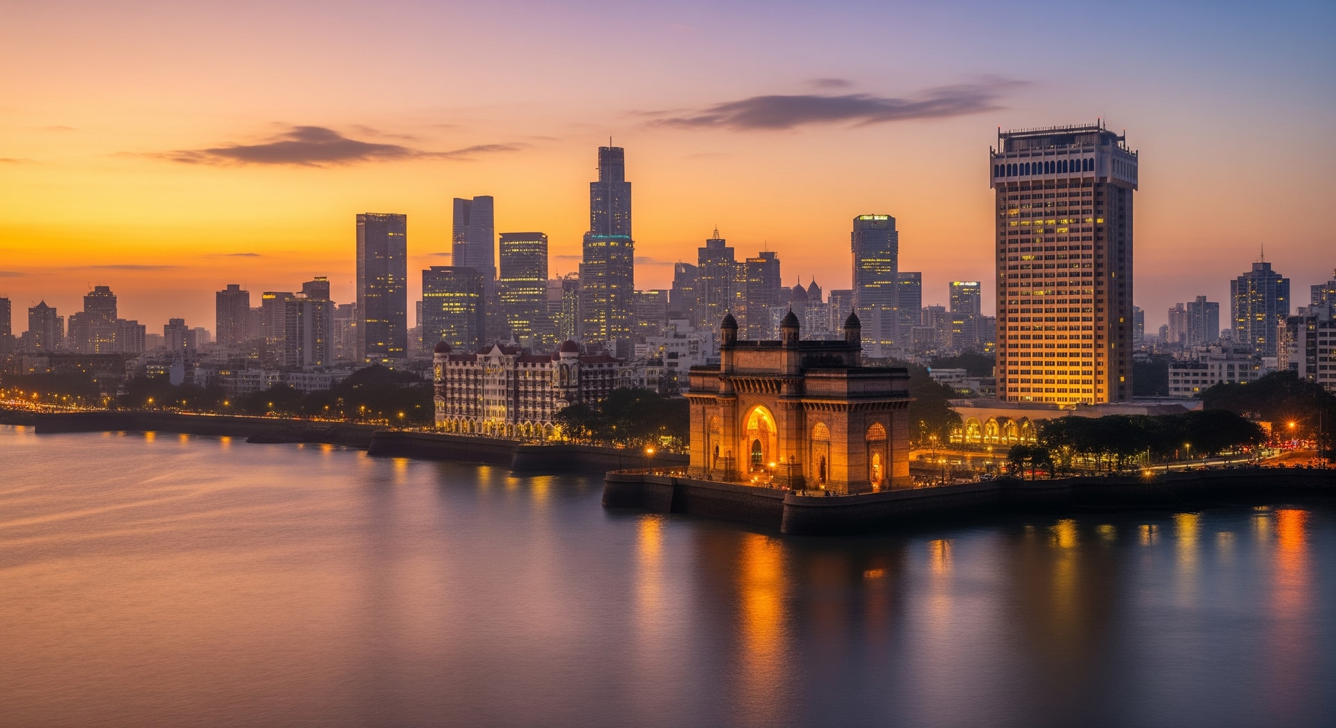 Modern Mumbai business district skyline with historic Gateway of India in foreground