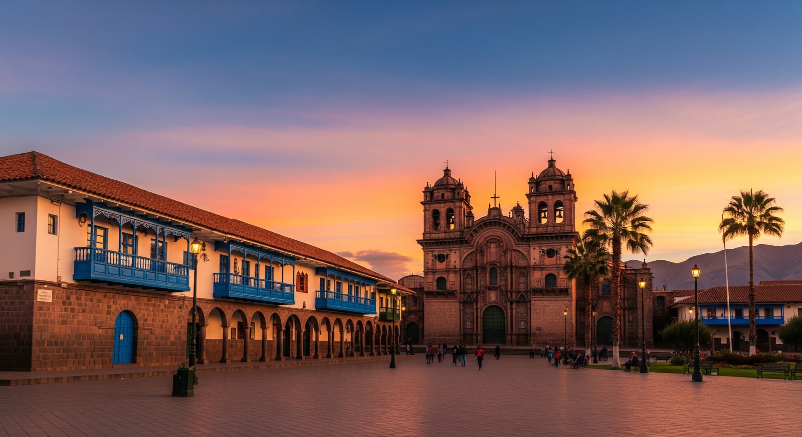 Colonial architecture of Cusco's Plaza de Armas with Inca stone foundations and Spanish churches at sunset