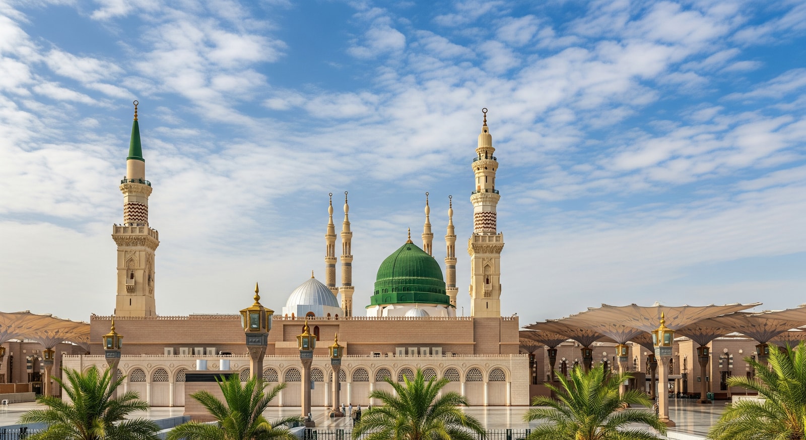 The Prophet's Mosque (Al-Masjid an-Nabawi) in Medina with distinctive green dome and ornate minarets