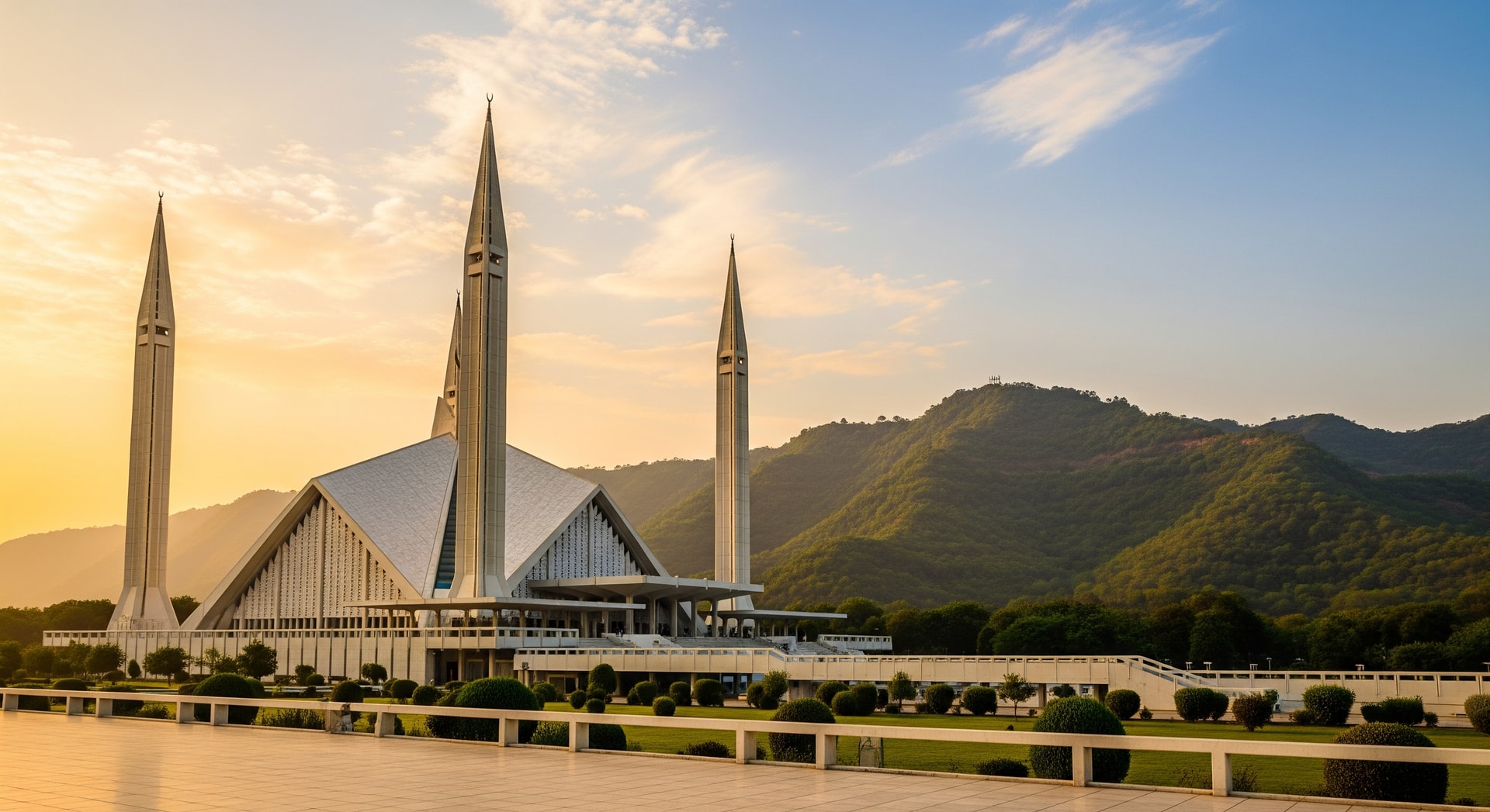 Faisal Mosque in Islamabad at golden hour with the Margalla Hills in the background representing Pakistan modern institutions and cultural heritage
