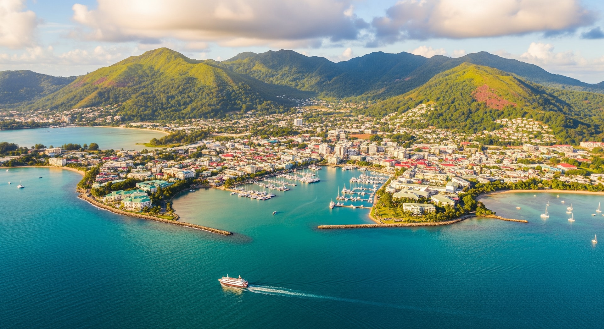 Aerial view of Mahé island and Victoria harbour, Seychelles, showing the capital city and Indian Ocean backdrop of this island nation