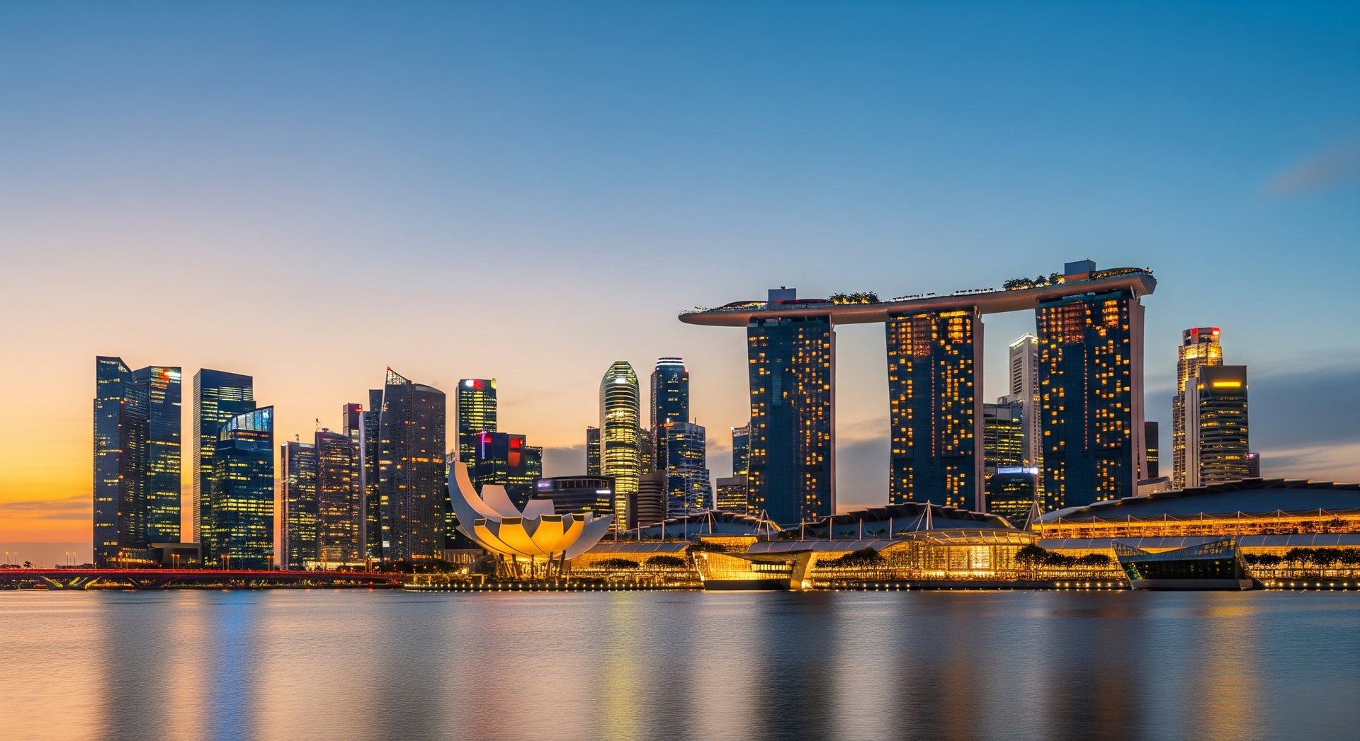 Singapore skyline featuring Marina Bay Sands and the Central Business District at dusk representing Singapore as a global hub for trade and immigration