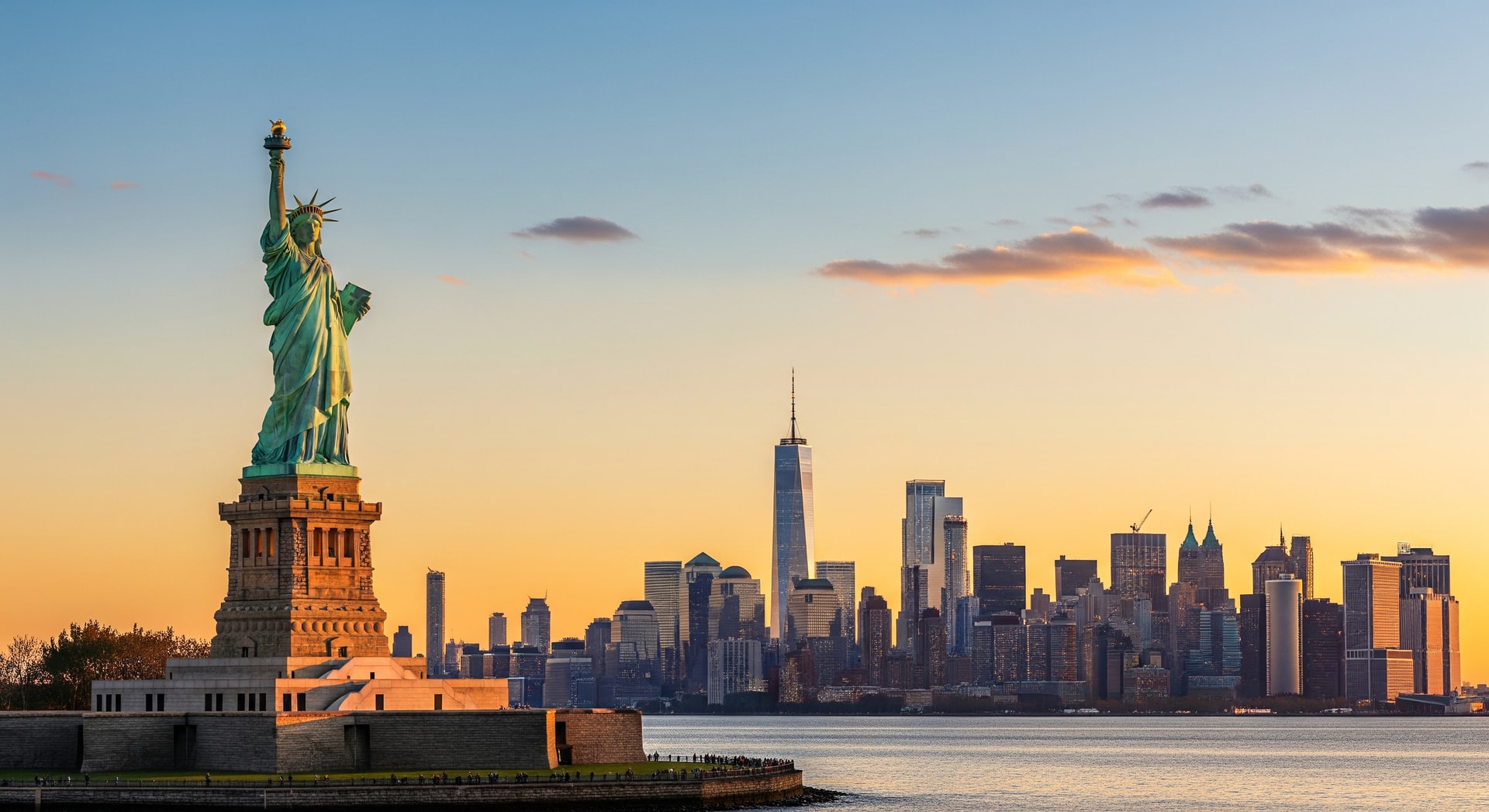 New York City skyline with the Statue of Liberty in the foreground representing the United States as a destination for immigration and international business