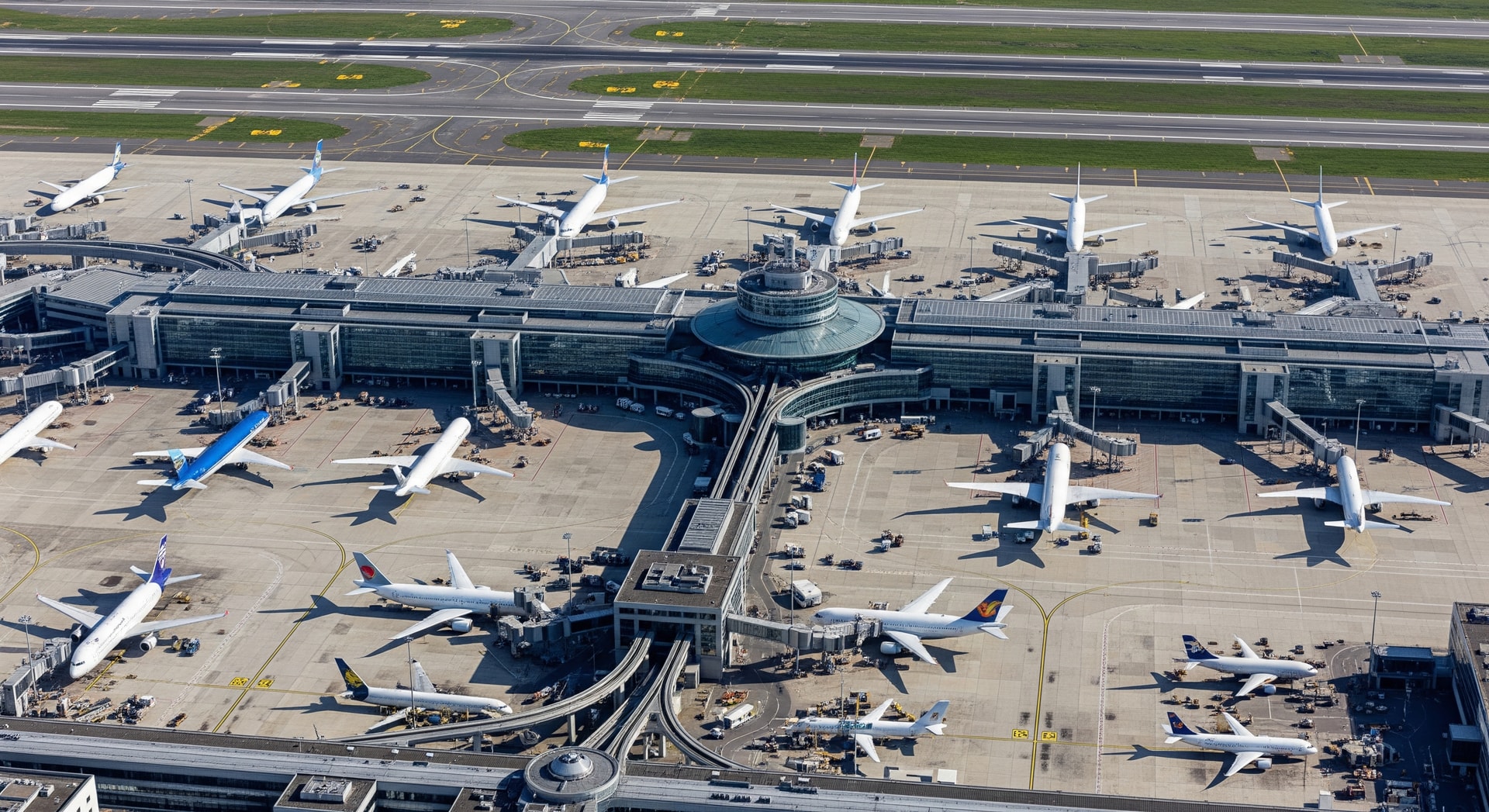 Aerial view of Frankfurt Airport terminals and runways with aircraft on the ground